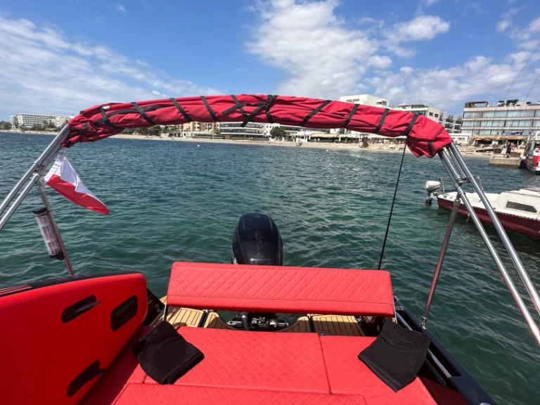 black boats black ruby charter bareboat eller skeppad i San Antonio Port