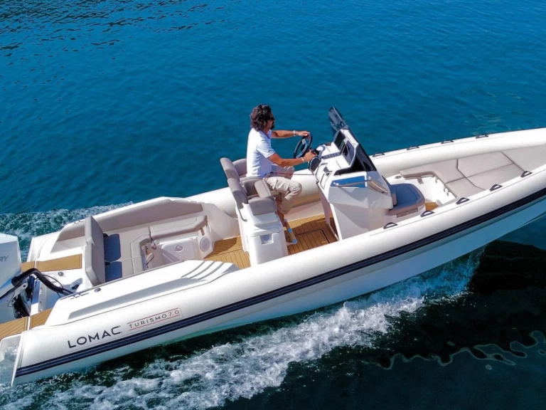 Lomac Turismo 7.0 charter bareboat eller skeppad i La Trinité-sur-Mer