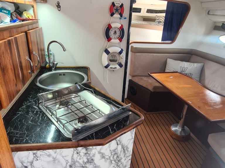 Wellcraft Monaco charter bareboat eller skeppad i Italien 